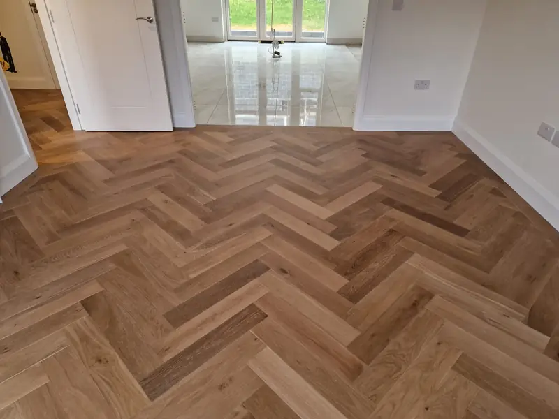 Classic parquet and herringbone patterns installed to add luxury and character to any interior.